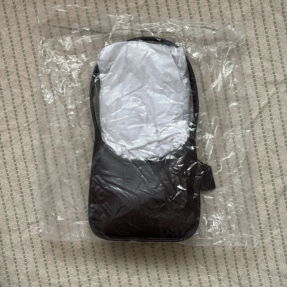 Coach Curve Zip Bag in Maple